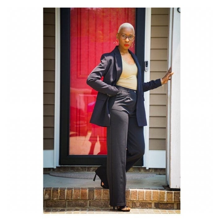 Women's Black Blazer Suit Pant with black heels standing on porch Set - Noir Envy Boutique